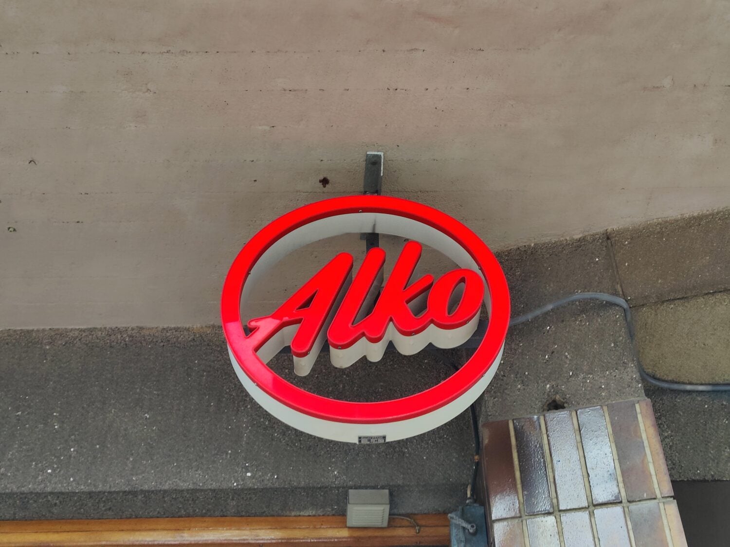 Alkon logo Helsingissä. VILLE MÄKILÄ