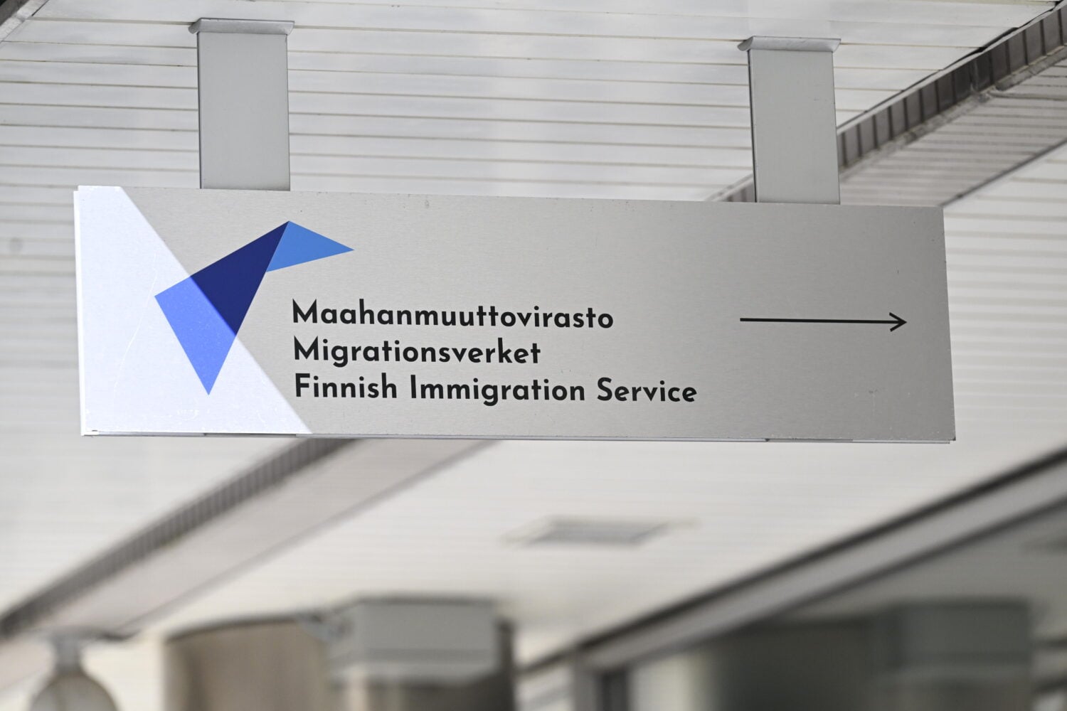 Maahanmuuttoviraston kyltti Helsingissä. LEHTIKUVA / JADE SILPO