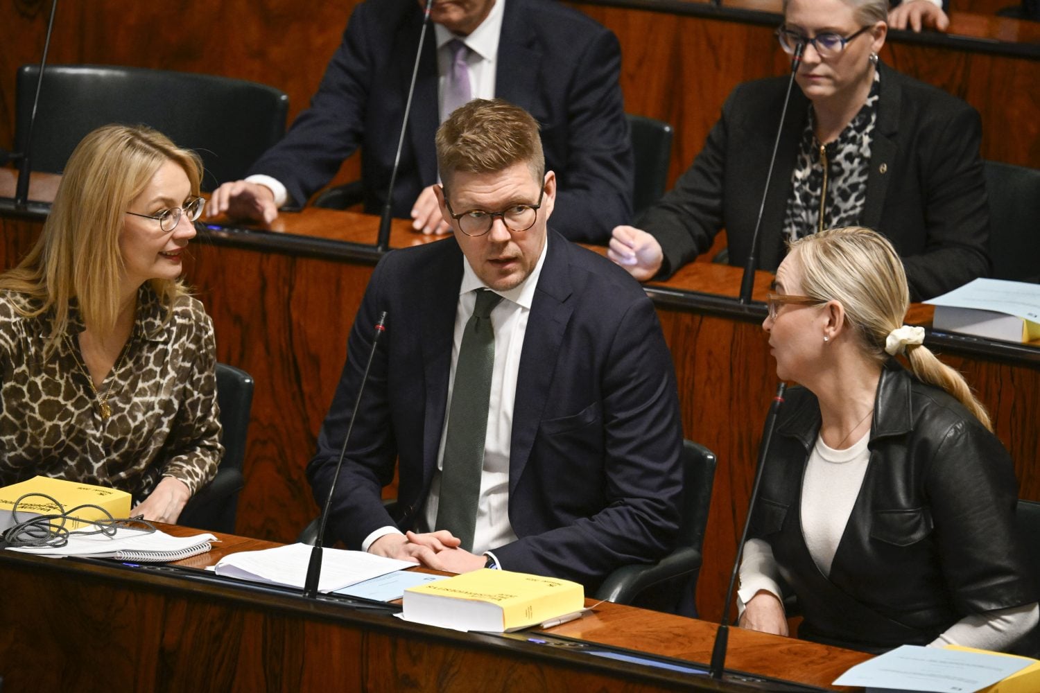 SDP MPs Tytti Tuppurainen, party chair Antti Lindtman and Eeva-Johanna Eloranta during a plenary session of Parliament in Helsinki on October 23, 2026. / LEHTIKUVA / MARKKU ULANDER